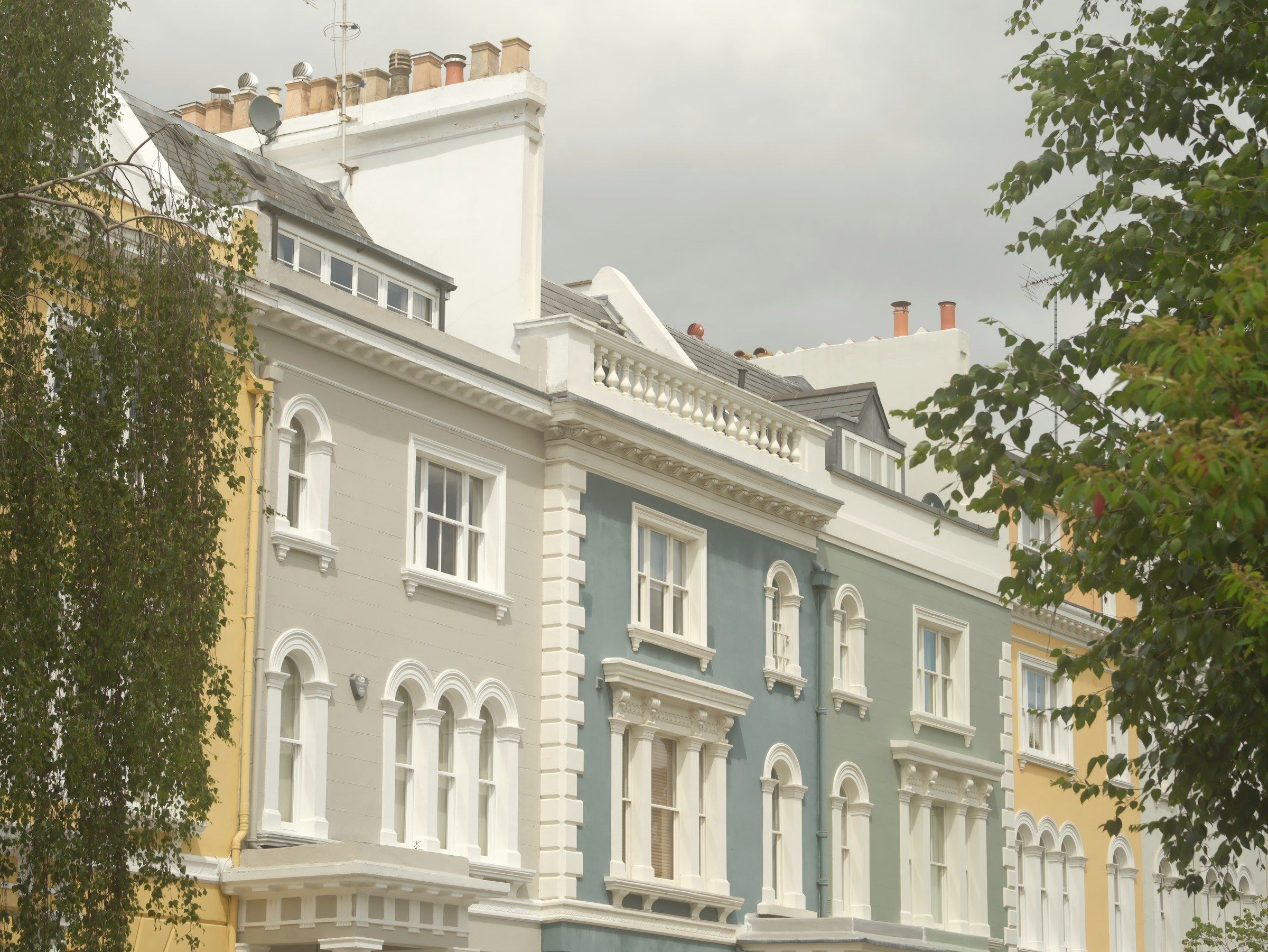 Row of painted Regency-style terraced houses